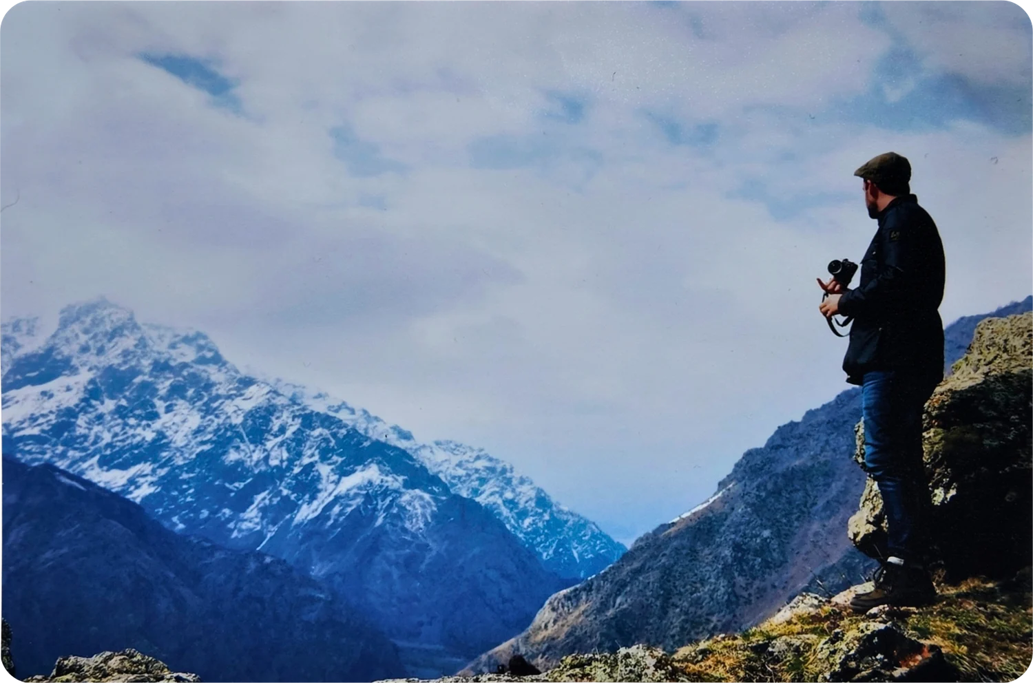 David in the mountains with a camera